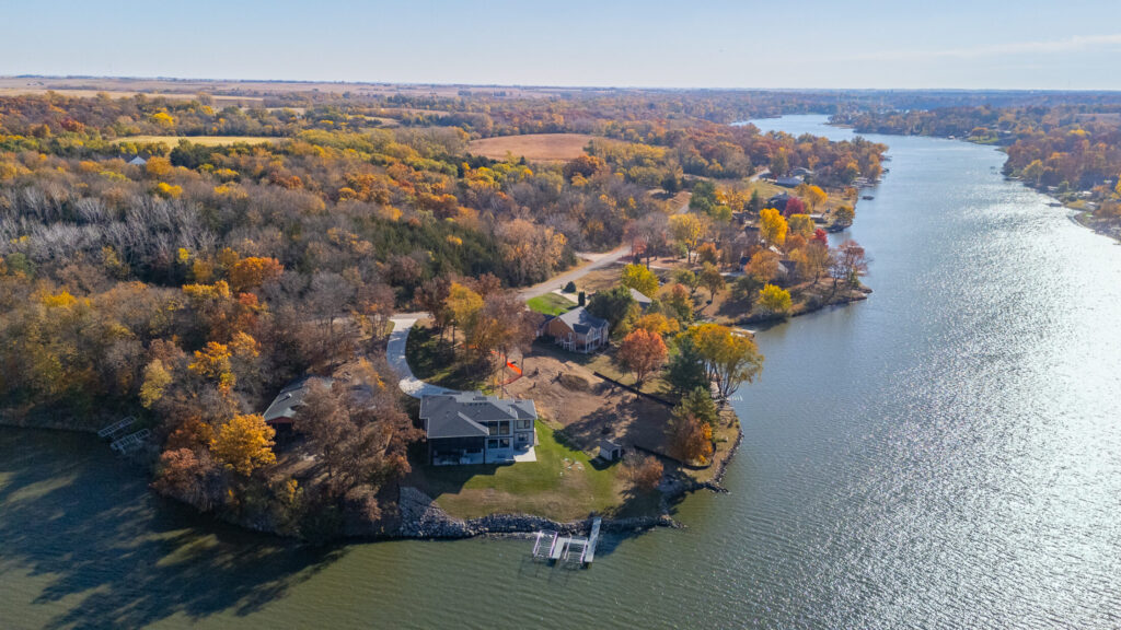 bird's eye view of a nice neighborhood lake panorama real estate 2025