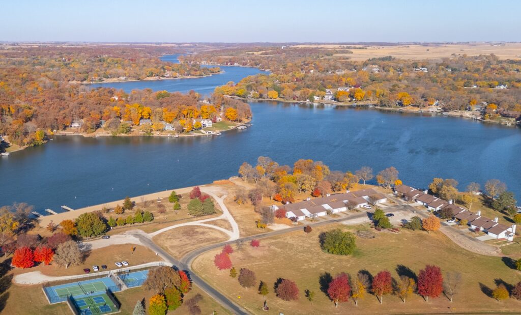 bird's eye view of a nice neighborhood lake panorama real estate 2025